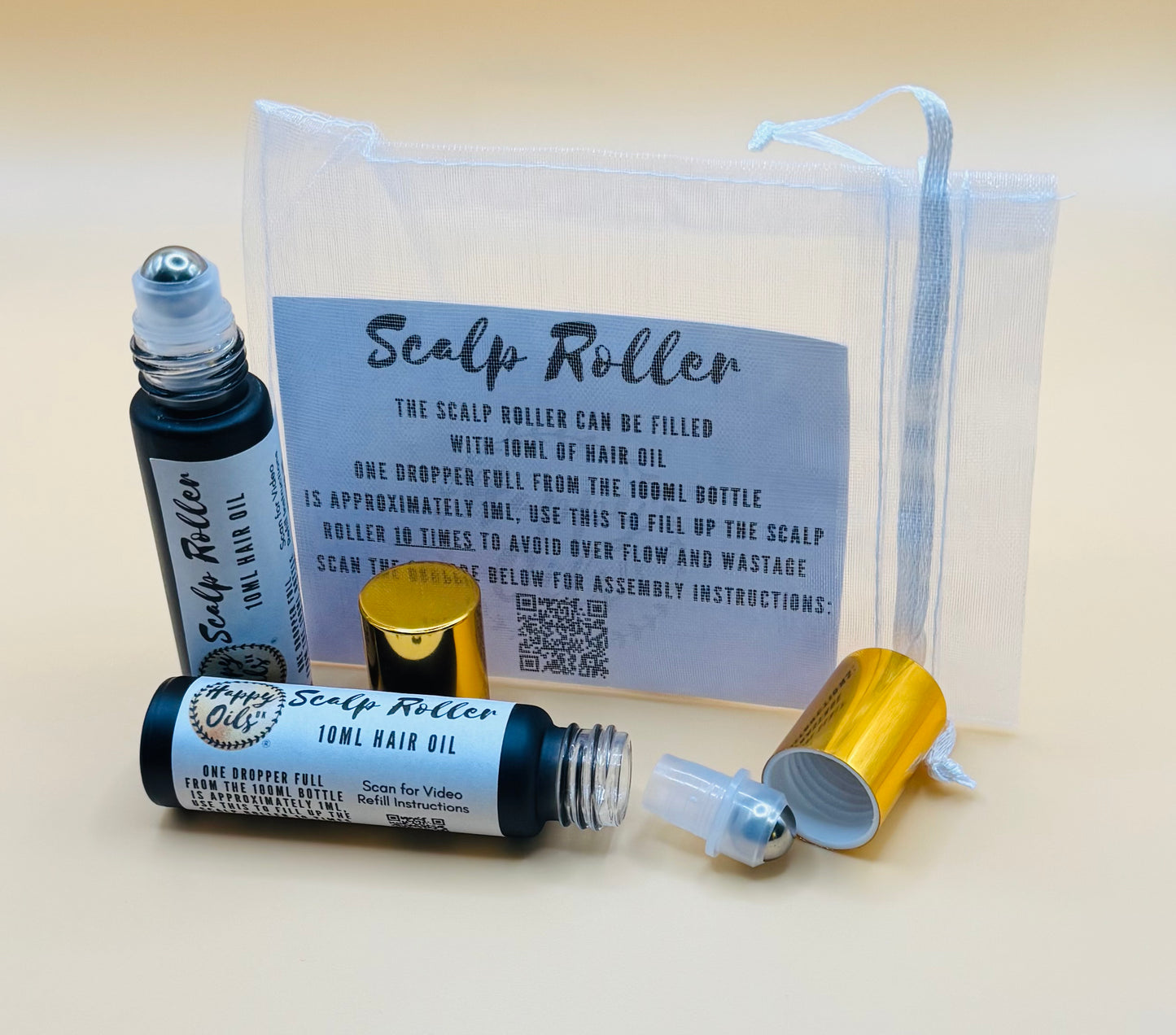 Scalp roller kit with roller bottles and a pouch on a beige background