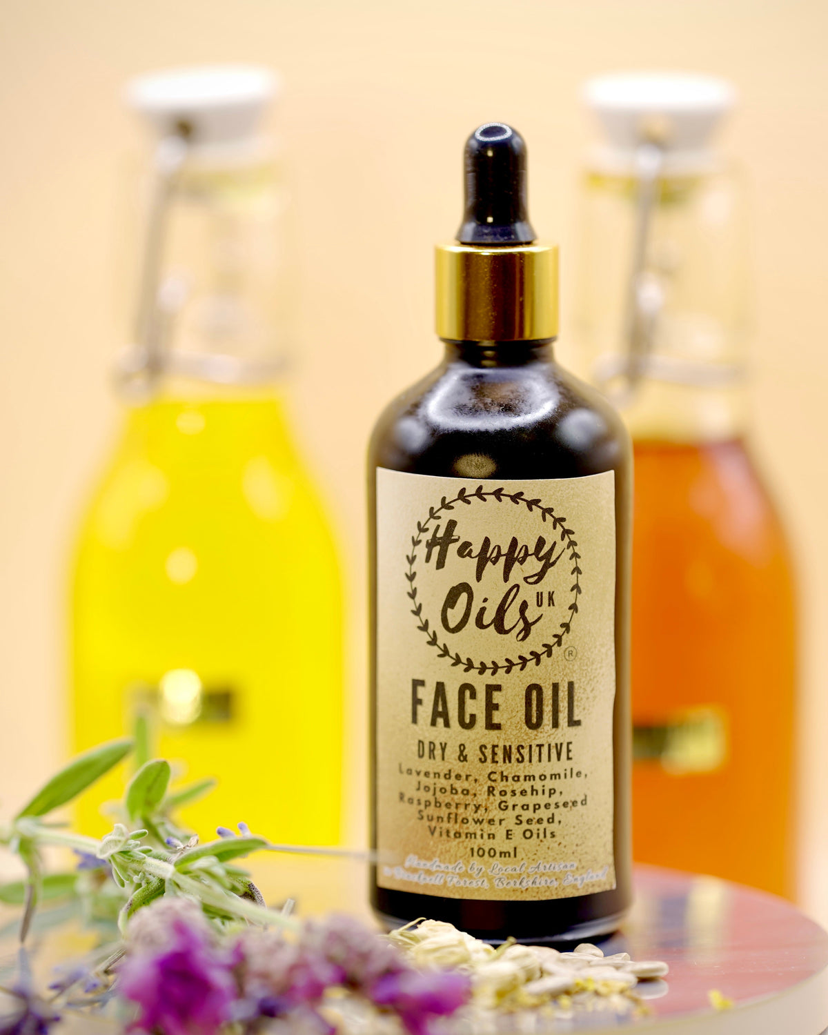 Happy Oils UK face oil dry & sensitive bottle with a dropper on a light background.

Ingredients listed: Lavender, Chamomile, Jojoba, Rosehip, Raspberry, Grapeseed, Vitamin E Oils